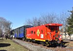 Delaware & Raritan River caboose # 133 trailing just as the train crosses Monmouth Avenue 